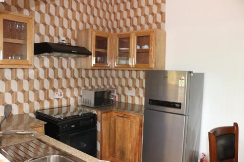 Η κουζίνα ή μικρή κουζίνα στο TAMA'S HOLIDAY APARTMENT