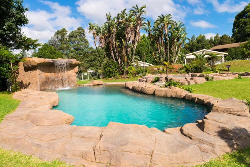 Piscina a ANEW Resort Ingeli Forest Kokstad o a prop