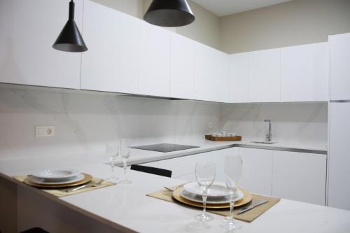 Кухня или мини-кухня в Apartamento Alaia
