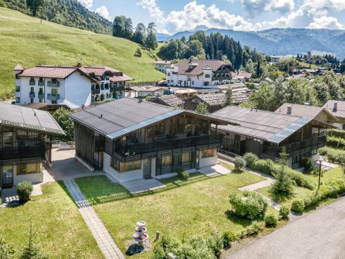 an aerial view of a house in a mountain at Chalet in Kirchberg near Ski Slopes in Kirchdorf in Tirol