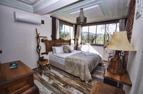 Postel nebo postele na pokoji v ubytování Ayşe Hanım Konağı