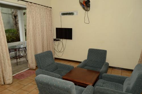 TV a/nebo společenská místnost v ubytování Dookee House