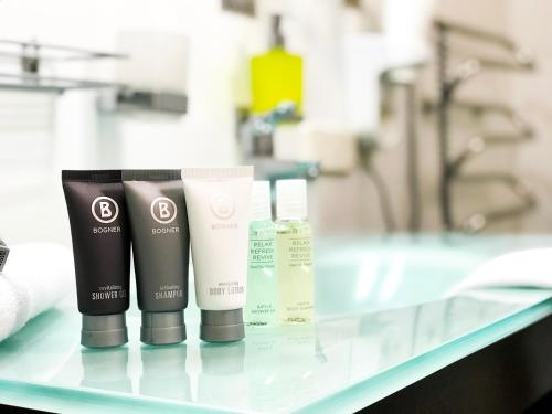 a glass table with three products on it at SPA Hotel in Vorzelʼ