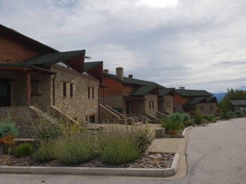 a row of houses in a row at Pallas Casa in Panagía