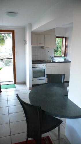 Η κουζίνα ή μικρή κουζίνα στο Casa Petra 1 1/2 Zi, Orgnana 83