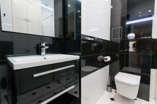 Kúpeľňa v ubytovaní Rental Apartments Krochmalna