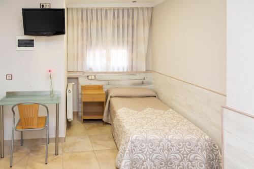 Letto o letti in una camera di Hostal Viky