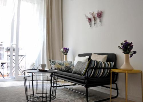 Een zitgedeelte bij Apartment Muñoz 1