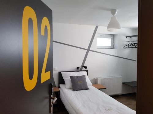 Postel nebo postele na pokoji v ubytování Kimanoclegi
