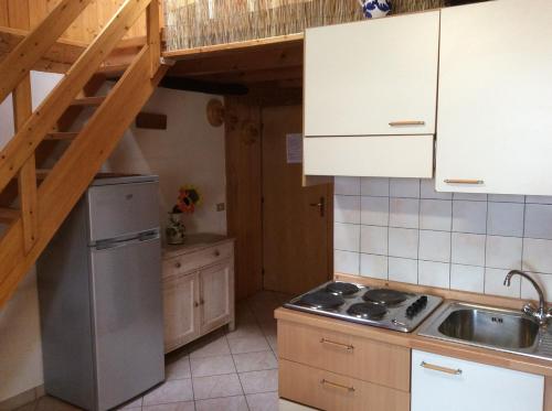 Dapur atau dapur kecil di Dinastia Case Snow Apartment