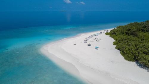 an aerial view of a beach with trees and water at Holiday Haven Ukulhas in Ukulhas