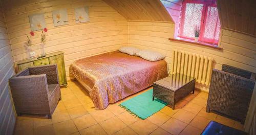 Ліжко або ліжка в номері Hotel Bannyi Dvor