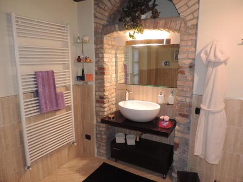 Ванная комната в Feeling at Home - Varese Apartment