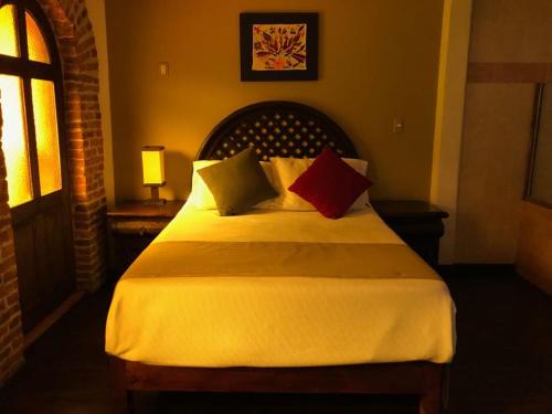 Postel nebo postele na pokoji v ubytování Spa Holistico Real Hotel