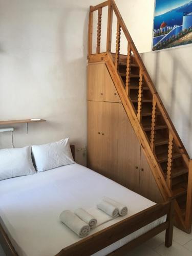 Postel nebo postele na pokoji v ubytování Santorini Grace Villa No1