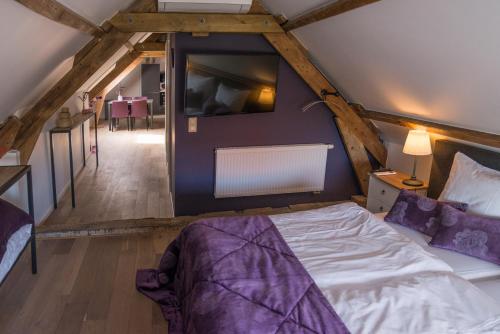 Tempat tidur dalam kamar di de Twie Keuninge