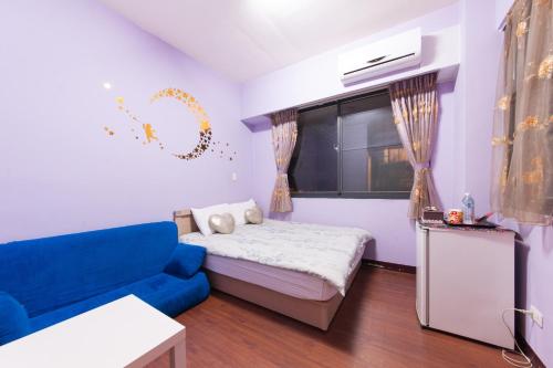 Katil atau katil-katil dalam bilik di Feng Jia Homestay