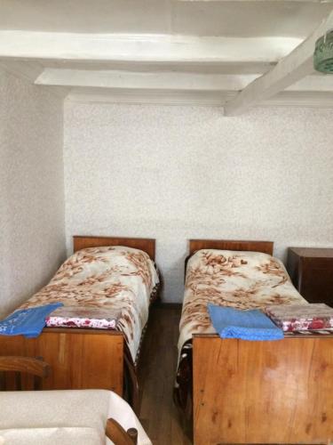 Postel nebo postele na pokoji v ubytování GoGni OLD ROOM
