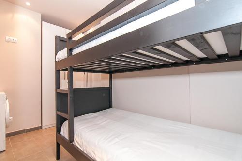 Katil dua tingkat atau katil-katil dua tingkat dalam bilik di Weflating Diagonal