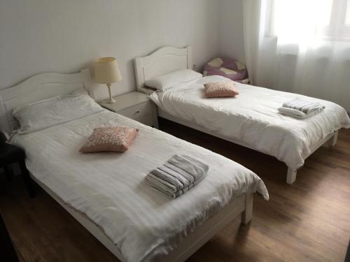 Кровать или кровати в номере Căsuța de sub pădure