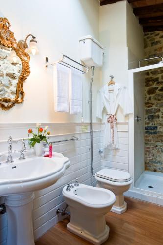a bathroom with a sink and a toilet at Tenuta Sant'Ilario in Gambassi Terme
