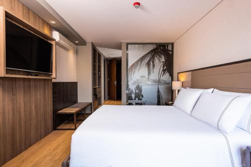 Katil atau katil-katil dalam bilik di Hotel Habitel Prime