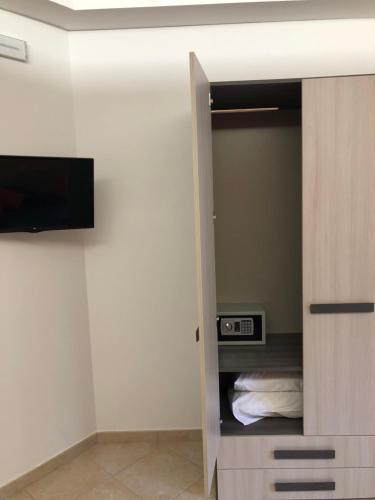 Μια τηλεόραση ή/και κέντρο ψυχαγωγίας στο Residenza De luca B&B