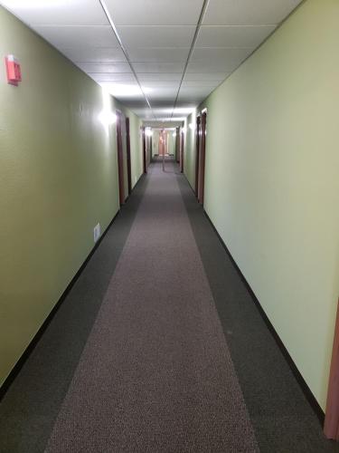 an empty hallway in an office building at Harbor Lights Lodge in Kewaunee