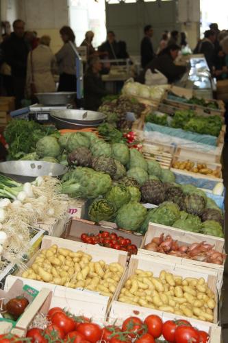 a display of vegetables in boxes at a market at La Bastide de Fontaille in Saint-Félicien