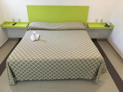 Postel nebo postele na pokoji v ubytování Hotel Boutique Dubai