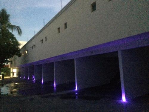 a building with purple lights on the side of it at Hotel Boutique Dubai in Acapulco