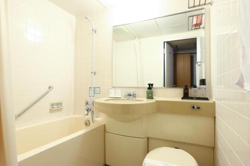 Vonios kambarys apgyvendinimo įstaigoje onsen hotel OMOTO