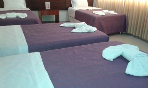 Katil atau katil-katil dalam bilik di El Puerto Hotel