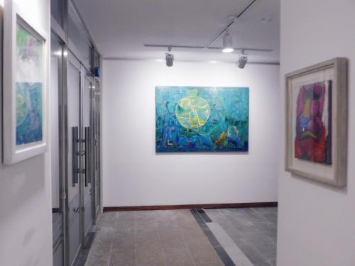 a room with a painting on a wall at Gallery Family Hotel in Mokpo