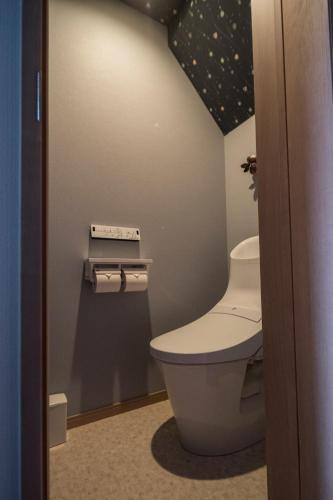 a small bathroom with a toilet in a room at KYOSTAY Iroha Komichi in Kyoto