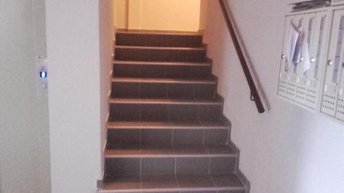 a stairway with a set of stairs in a house at Olivia in Jagodina