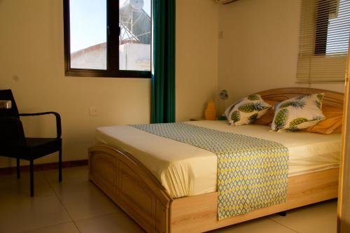 Ein Bett oder Betten in einem Zimmer der Unterkunft Zanana Penthouse
