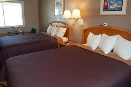 Cape Cod Innにあるベッド