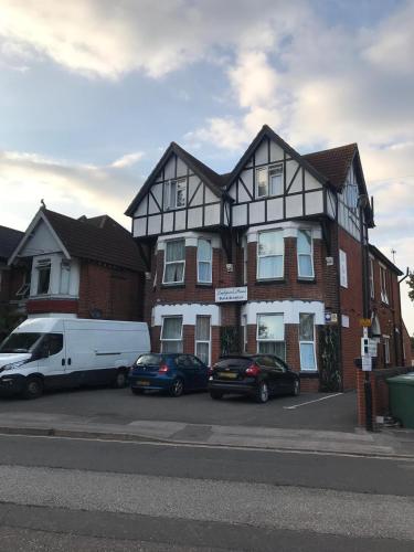 a white van parked in front of a house at Landguard House Bed Only in Southampton