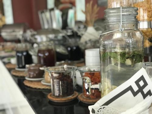 a jar of food sitting on a counter with other items at Bugday Hotel in Ankara
