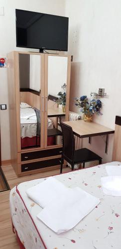 Postel nebo postele na pokoji v ubytování Hostal De La Torre Hostal Economico