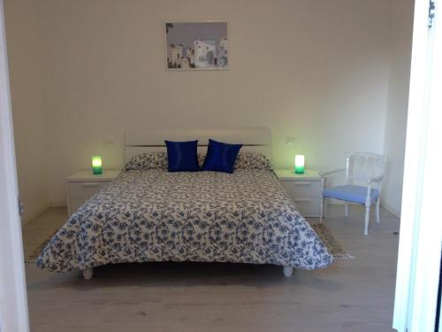 Säng eller sängar i ett rum på Via Cipro 16