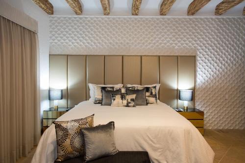 Cama o camas de una habitación en Visus Hotel Boutique & Spa