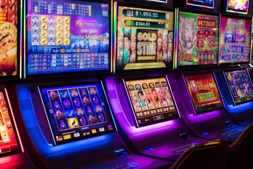 a bunch of slot machines in a casino at Hotel Guarani Asuncion in Asuncion