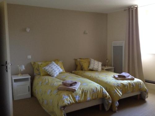 Ένα ή περισσότερα κρεβάτια σε δωμάτιο στο Auberge de la vallee de la gorre