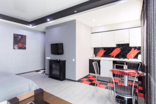 Μια τηλεόραση ή/και κέντρο ψυχαγωγίας στο Kharkiv Apartments on Nauky avenue