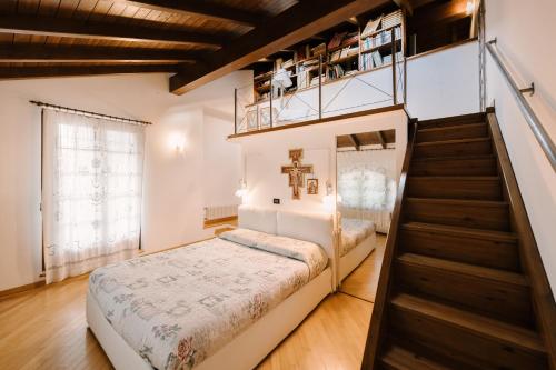 Tempat tidur dalam kamar di Villa Rosalia