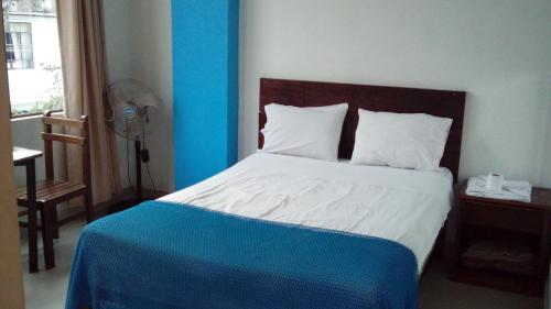 Krevet ili kreveti u jedinici u okviru objekta Suites El Parque