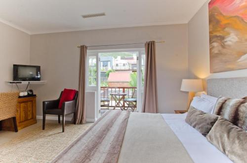 Letto o letti in una camera di Villa Costa Rose