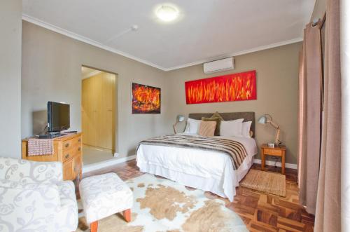 Letto o letti in una camera di Villa Costa Rose
